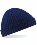 A navy blue knit beanie hat with a ribbed texture and a folded brim, isolated on a white background. The Beechfield BC460 is slightly tilted to the right.