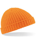 A bright orange Beechfield BC460 ribbed knit beanie with a folded cuff, isolated on a white background.