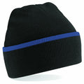 A BC471 beanie by Beechfield featuring a black knit design with a blue stripe around the brim.