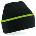 Introducing the Beechfield BC471, a sleek black knitted beanie adorned with a vibrant green stripe encircling its entire circumference. The beanie is showcased against a clean white background, highlighting its simple yet stylish design.