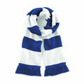 The Beechfield BC479 scarf, featuring wide alternating blue and white horizontal stripes, is neatly folded with ends adorned in blue fringe.