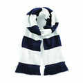 The Beechfield BC479 is a knitted scarf with wide navy and white horizontal stripes, featuring fringed ends.