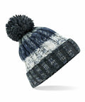 A Beechfield BC486 hat in blue and gray featuring a pom-pom on top.
