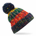 The Beechfield BC486 is a colorful woolen beanie adorned with a large pom-pom on top. It showcases a vibrant knitted pattern that mixes red, blue, green, and yellow.