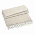 Beechfield's BC500 blanket in a soft pale gray shade, featuring fringed edges, elegantly displayed against a plain background.