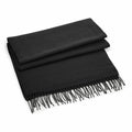 A BC500 scarf by Beechfield, featuring a folded black design with fringed ends, laid on a flat surface.