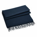 A neatly folded dark blue BC500 scarf by Beechfield, featuring fringed edges, displayed on a white background.