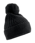 A black bobble hat with a knitted design, turned-up brim, and large pom-pom, shown on a white background.