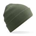 A Beechfield BC52N green knitted beanie with a folded brim, showcased against a white background, featuring a textured, waffle-like pattern.