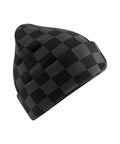 Beanies with a black and grey chequerboard knit pattern, folded brim, and slightly slouchy shape displayed on a plain white background.