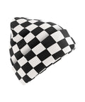 A beanie hat featuring a black and white chequered grid pattern is shown against a white background.