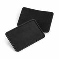Introducing the BC600 by Beechfield: two black rectangular patches made of fabric, featuring rounded edges with one slightly overlapping the other.
