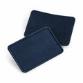 Two BC600 patches by Beechfield, featuring a rectangular shape in black fabric with slightly overlapping textured surfaces, set against a white background.