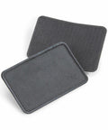 Two rectangles of black Beechfield BC600 elbow brace pads are displayed. One pad is positioned on top of the other, slightly offset, showcasing different textures. Both pads have rounded corners and visible seams around the edges.