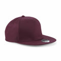 A Beechfield BC610 burgundy flat-brimmed snapback cap with a sticker on the visor.