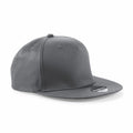 A gray Beechfield BC610 baseball cap with a flat brim is displayed at a slight angle, featuring a sticker on the brim that shows size and brand information. The fabric looks smooth and unadorned.