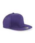 A Beechfield BC610 snapback cap in purple featuring a flat brim and a sticker on the visor.