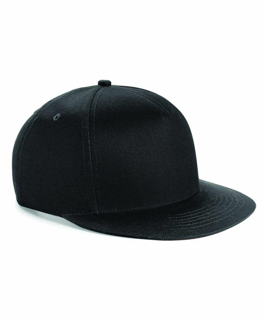 A black BC615 from Beechfield with a flat brim and a classic six-panel design, shown from a side angle on a white background. The hat appears simple and unadorned, with a smooth fabric and no visible logos or embellishments.