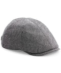 The Beechfield BC621, a grey tweed flat cap featuring a short brim, is displayed against a white background.