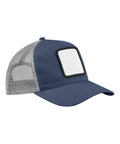 The Caps hat is a blue and white mesh lorry driver style with a blank white square patch outlined in black on the front panel, displayed at a three-quarter angle against a white background.