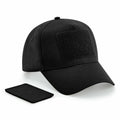 Beechfield BC638 black baseball cap featuring a rectangular velcro patch on the front, showcased alongside a removable patch.