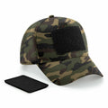 The Beechfield BC638 is a camouflage baseball cap that comes with a blank black Velcro patch on the front, along with an extra detachable black patch included.