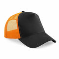 The Beechfield BC640 is a trucker hat featuring a solid black front panel and an orange mesh back. It comes with a curved brim and is displayed against a white background.