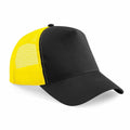 Beechfield BC640 trucker cap featuring a black and yellow design with a mesh back panel.