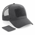 Beechfield's BC641 is a black mesh trucker hat that features a detachable patch on the front.