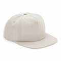 A plain beige Beechfield baseball cap (BC64N) featuring a flat brim, displayed from a side angle. The cap looks brand new and is free of any logos or designs.