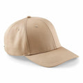 Introducing the Beechfield BC651, a beige baseball cap featuring a curved brim and a stitched panel design. This stylish cap is equipped with ventilation holes on each panel and includes an adjustable strap at the back for a perfect fit.