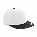A Beechfield BC660 white and black flat-brimmed baseball cap with a sticker on the brim.