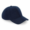 The Beechfield BC677 is a dark blue baseball cap featuring a curved brim and six panels.