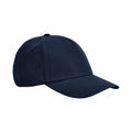 A Beechfield BC825 navy blue baseball cap featuring a curved brim, set against a plain white background.
