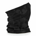 The Beechfield BC900 neck gaiter, featuring a dark camouflage pattern, is displayed against a white background. The fabric is folded to highlight its design and texture.