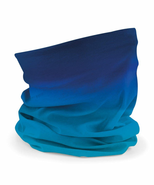 A versatile, multi-functional headwear piece **BC905 by Beechfield** in shades of blue with an ombré effect, transitioning smoothly from a darker blue at the top to a lighter blue at the bottom. The fabric is gathered and layered, creating a textured and comfortable appearance.