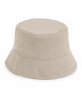Introducing the Beechfield BC90N, a beige bucket hat featuring a classic round top and wide brim. Made with smooth fabric and detailed stitching around the brim and body, this hat boasts a simple design perfect for casual wear.