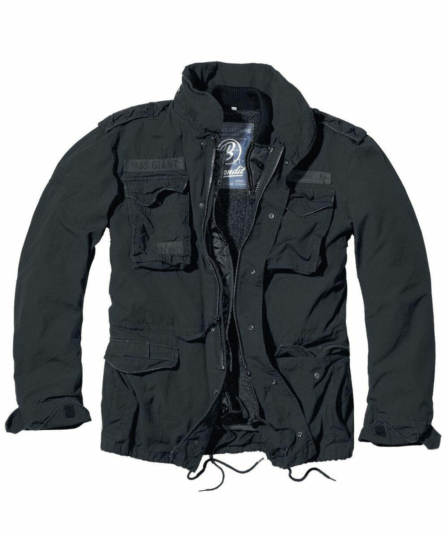 The BD301 military-style jacket by Build Your Brandit, featuring a dark green color with multiple pockets and zippers, is laid flat on a white background.