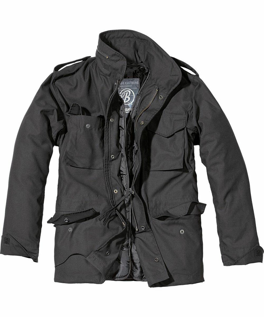 The BD308 by Build Your Brandit is a black military-style jacket featuring multiple front pockets and a front zipper, showcased against a plain white background.