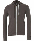 The BE106 by Bella + Canvas is a dark gray zip-up hoodie featuring plain design elements, white drawstrings, and front pockets, showcased against a clean white background.