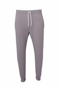 The BE126 jogger pants by Bella + Canvas come in gray, featuring an elastic waistband with a white drawstring and ribbed cuffs at the ankles. These pants offer a simple, casual design without any visible logos or additional features.