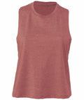 The Bella + Canvas BE127 is a faded red, sleeveless tank top with a scoop-neck design. The fabric looks soft and slightly textured, offering a relaxed fit without any visible logos or patterns.