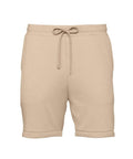 The Bella + Canvas BE135 shorts come in beige, featuring an elastic waistband with a drawstring, side pockets, and a rolled hem.