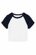 Introducing the BE143 by Bella + Canvas: a stylish raglan crop top featuring short sleeves, a classic round neckline, and a chic color contrast with a white body and black sleeves and neckline.