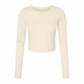 The BE144 long-sleeve crop top in cream by Bella + Canvas.