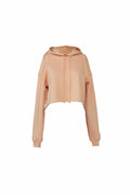 The Bella + Canvas BE220 is a long-sleeved, peach-colored cropped hoodie with a drawstring hood, showcased against a white background. It features a relaxed fit and ribbed cuffs.
