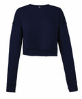 The BE221 by Bella + Canvas is a navy blue, long-sleeved crop top featuring a crew neckline and a loose fit. It comes with ribbed cuffs and has a slightly curved hem.