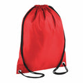 Product Data: A Bagbase BG005 featuring a red drawstring backpack with black straps and metal grommets at the bottom corners, displayed against a white background.