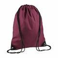 Bagbase BG010 is a maroon drawstring backpack featuring black straps and grommets, crafted from smooth fabric, shown against a plain white background.