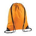 Bagbase's BG010 is an orange drawstring backpack featuring black strings and reinforced corners with metal eyelets for a simple and practical design.